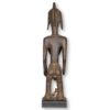 Female Bamana statue with cowrie shell eyes