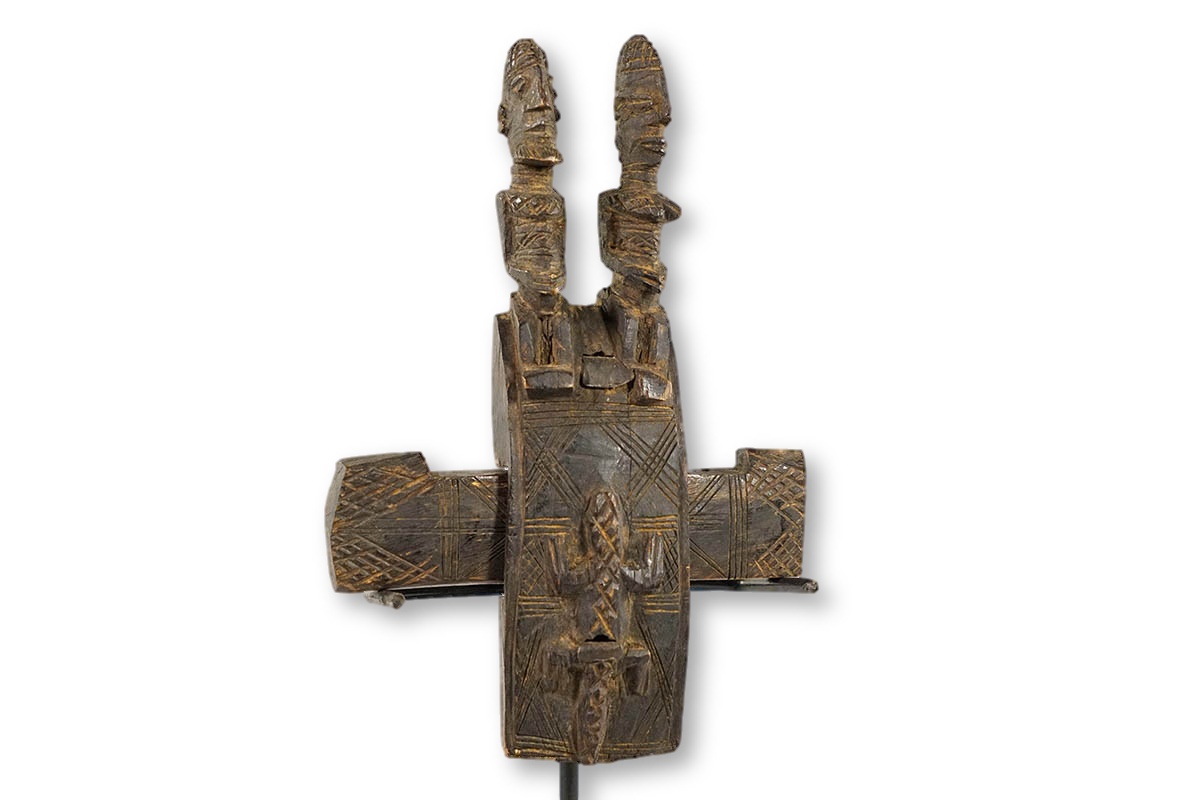 Dogon door lock with reptile on front and two figures sitting on top