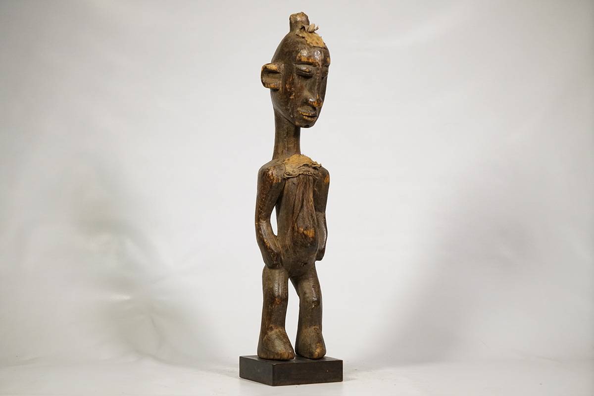 Bamana style statue with animal hide and hair