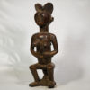 female Kwere statue with child on her back