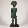 green colored African wooden statue