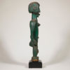 green colored African wooden statue
