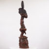 This statue was carved in the style of an Ose Sango (Oshe Shango) by the Yoruba people of Nigeria. Ose Sango figures represent the thunder god, Sango. The statue measures 39.5 inches tall and weighs 19 pounds. There is some cracking and wear and tear throughout - please inspect photos.